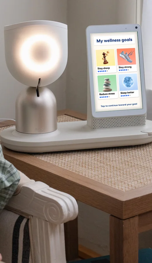 ElliQ 3 companion robot for older adults compared with mobile senior living robots like Mirokaï